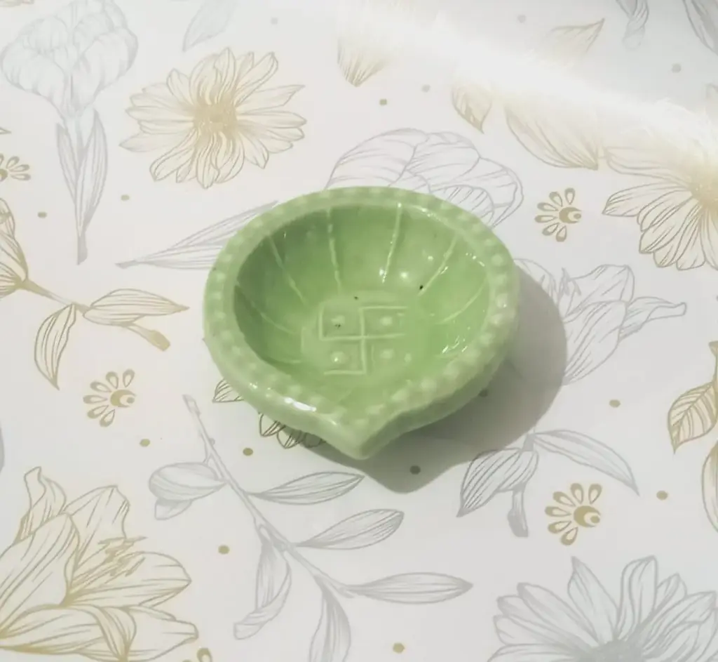 Green Swastik Design Diya ( 6 pc )