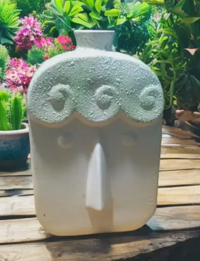 ceramic face vase