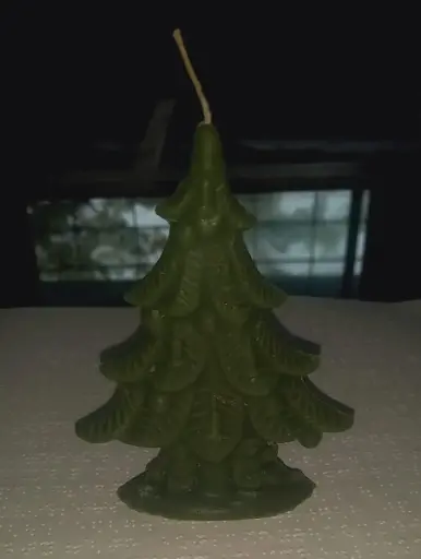 green chistmas tree shaped candle
