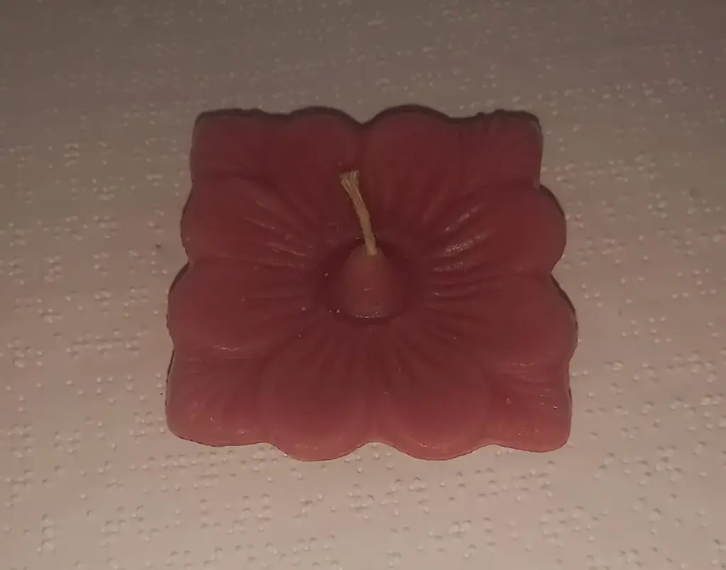 Red diya shaped candle