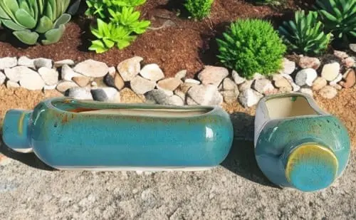 BOTTLE SHAPED TREE PLANTER