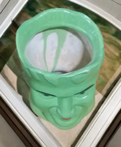 Green Face Shaped tree planter